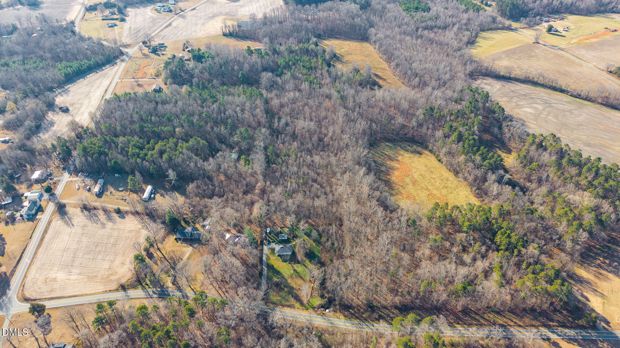4244 Alamance Church Road Liberty, NC 27298 - Photo 24 of 37 a aerial view of a house with swimming pool and large trees