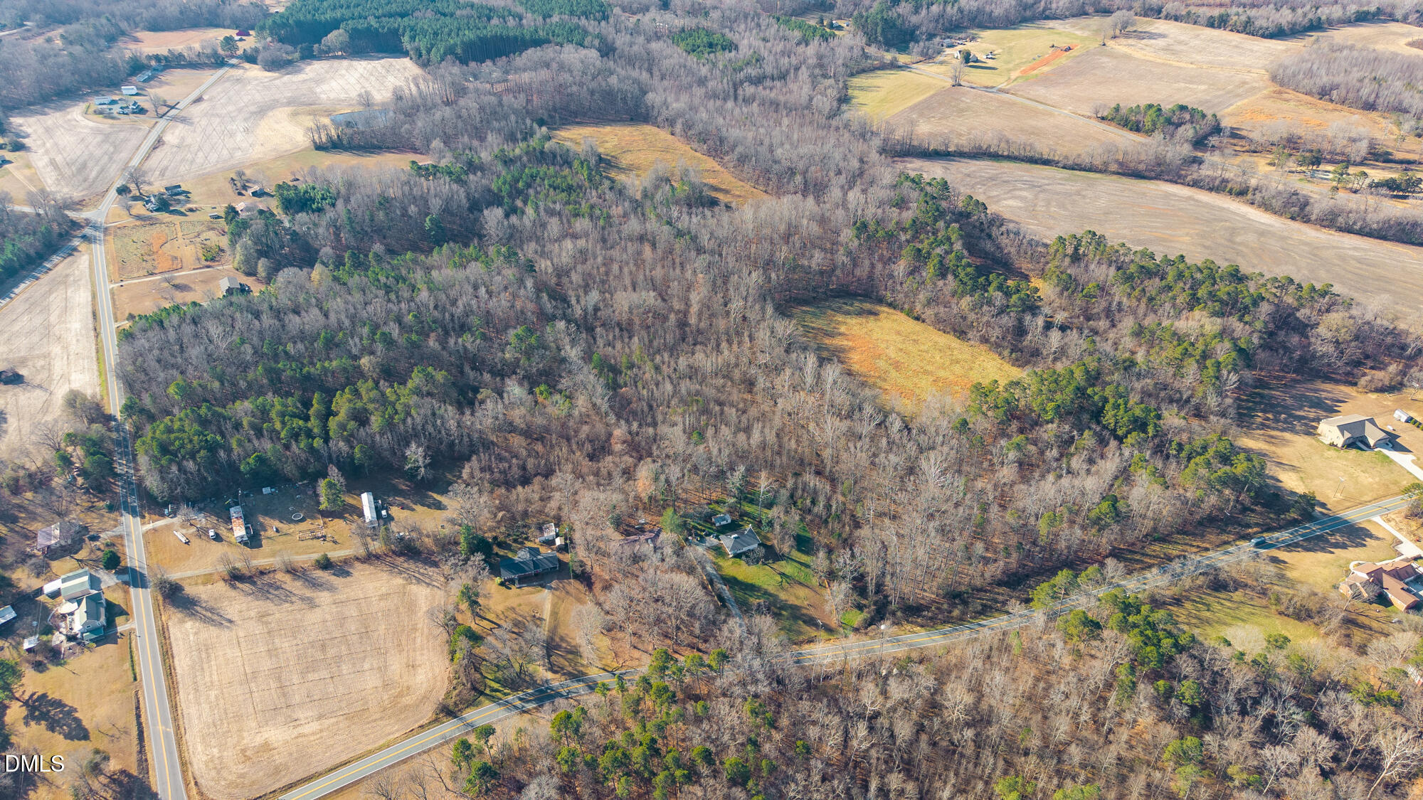 4244 Alamance Church Road Liberty, NC 27298 - Photo 26 of 37 a aerial view of a house with a yard and lake view