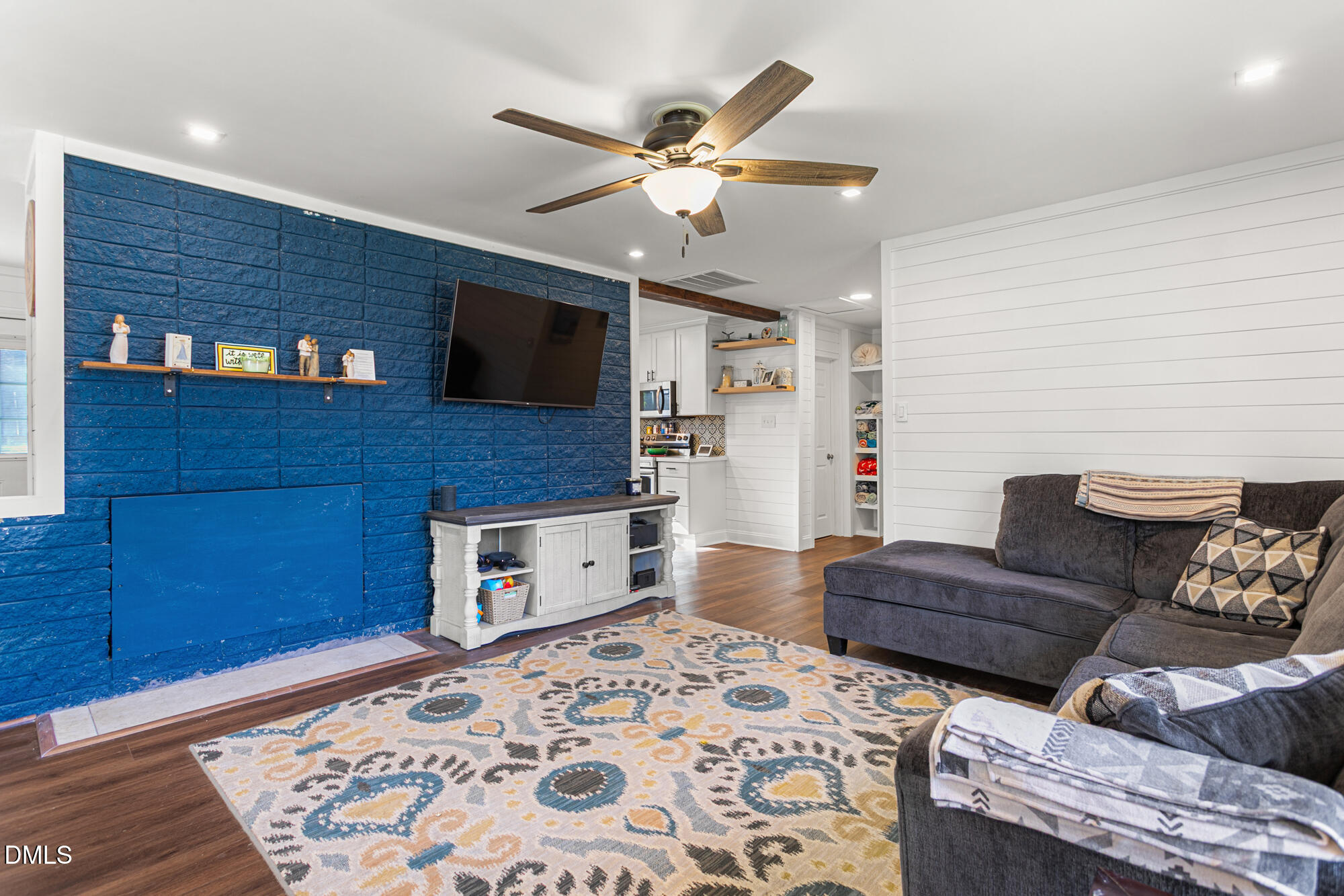 4244 Alamance Church Road Liberty, NC 27298 - Photo 3 of 37 a living room with furniture and a flat screen tv