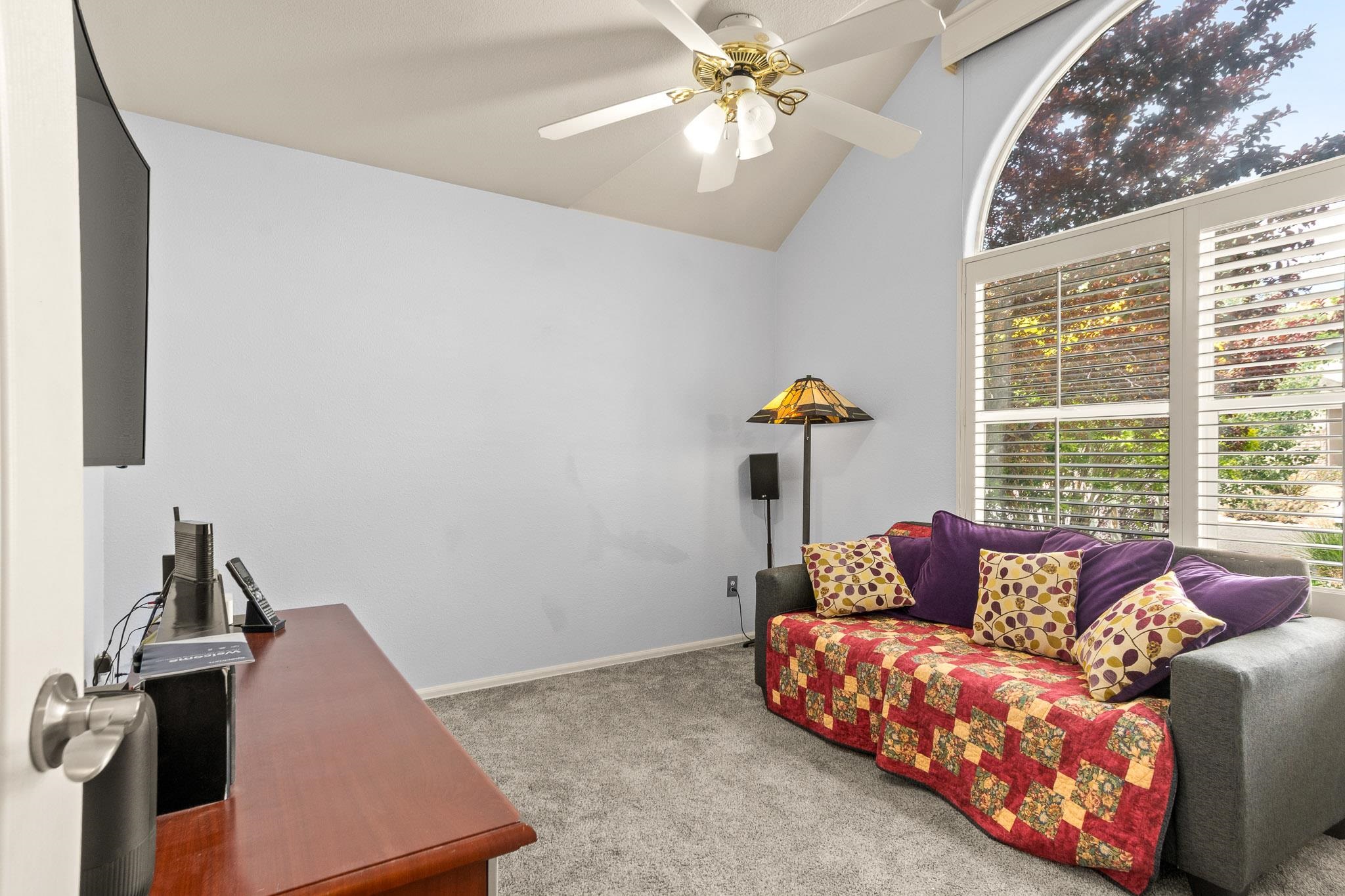 398 Butte Court Grand Junction, CO 81507 - Photo 17 of 33 a living room with furniture and a window