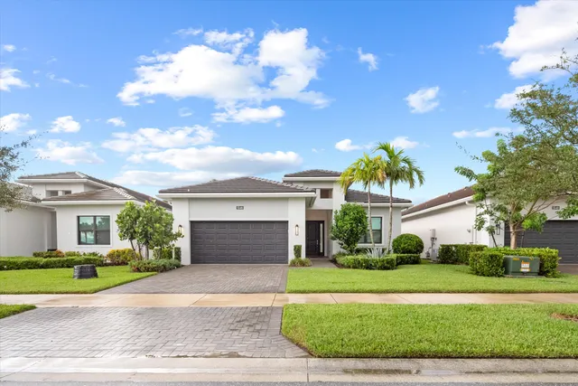 a view of an empty room and a window