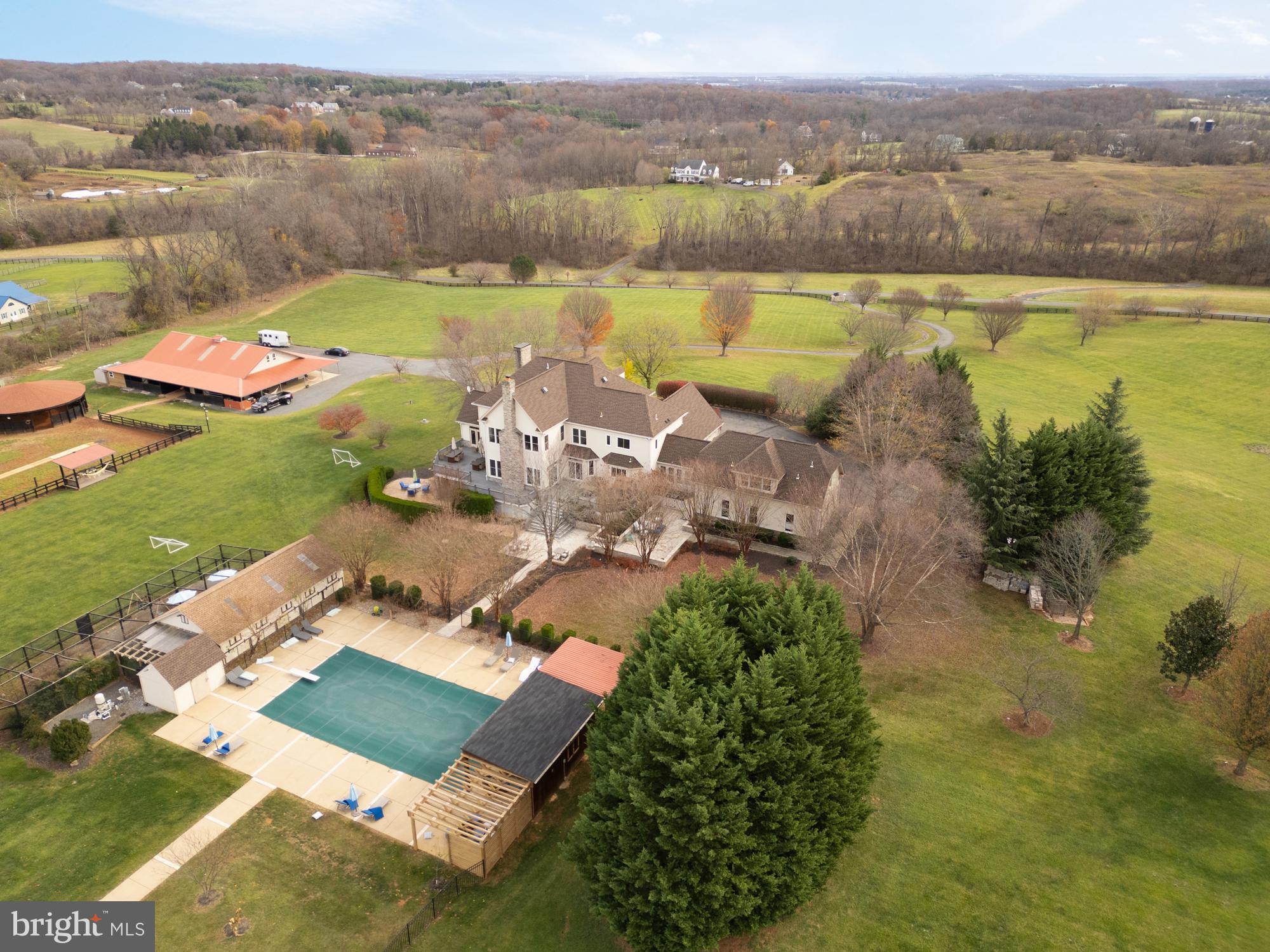19109 Peale Lane Leesburg, VA 20175 - Photo 126 of 135 an aerial view of a house with a lake view