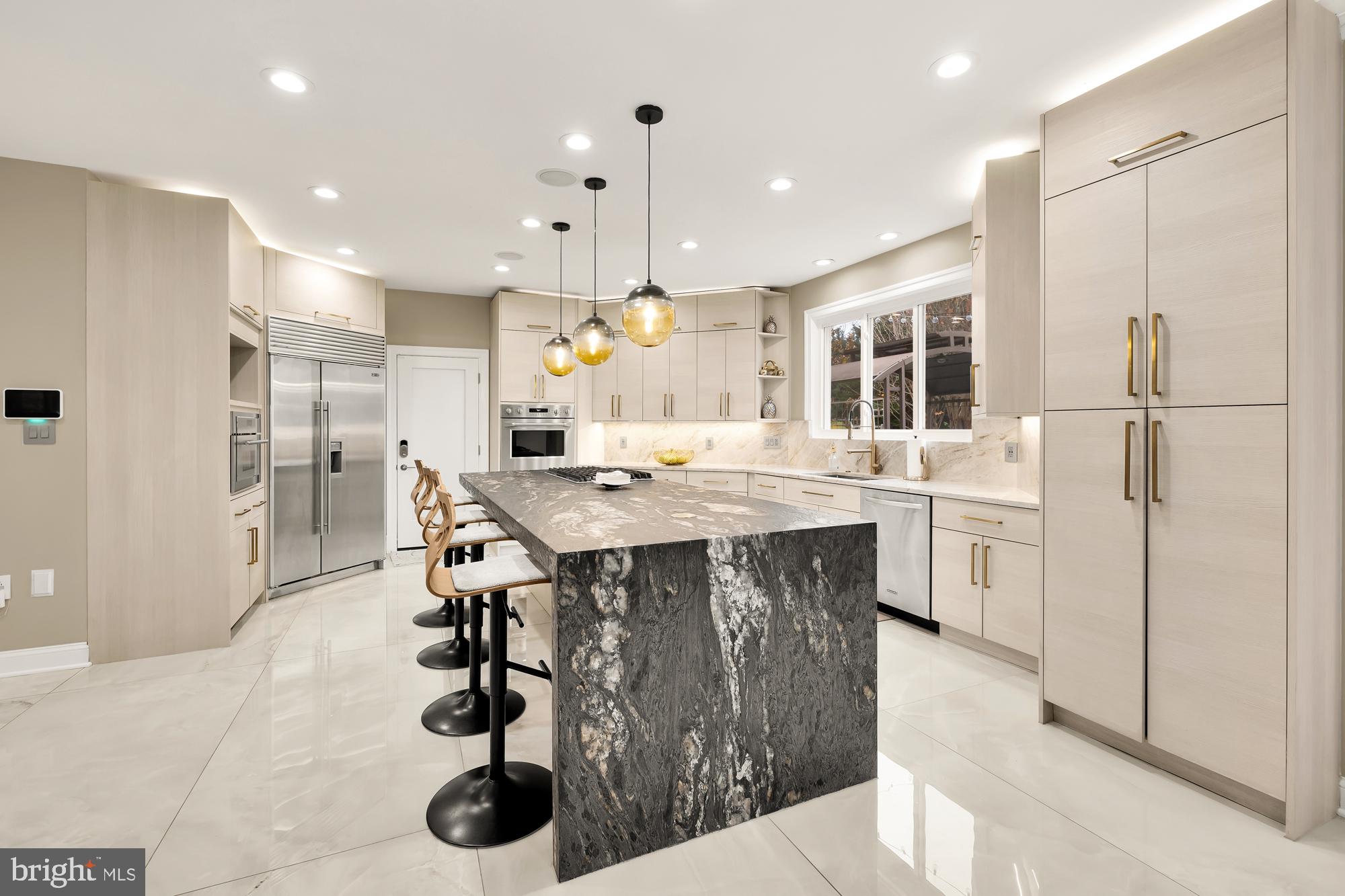 19109 Peale Lane Leesburg, VA 20175 - Photo 27 of 135 a kitchen with granite countertop a sink appliances and cabinets