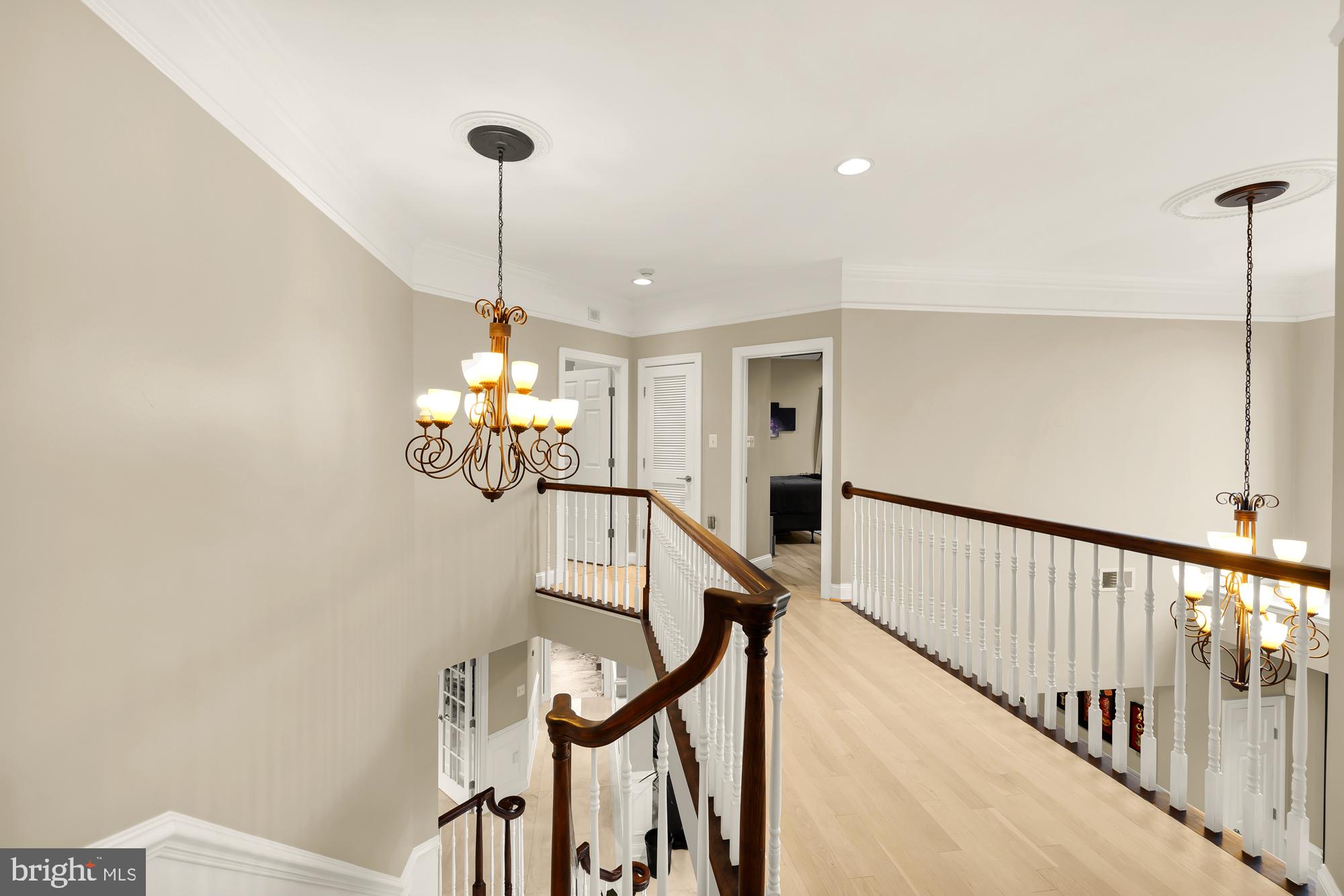 19109 Peale Lane Leesburg, VA 20175 - Photo 39 of 135 a dining room with wooden floor chandelier and entryway