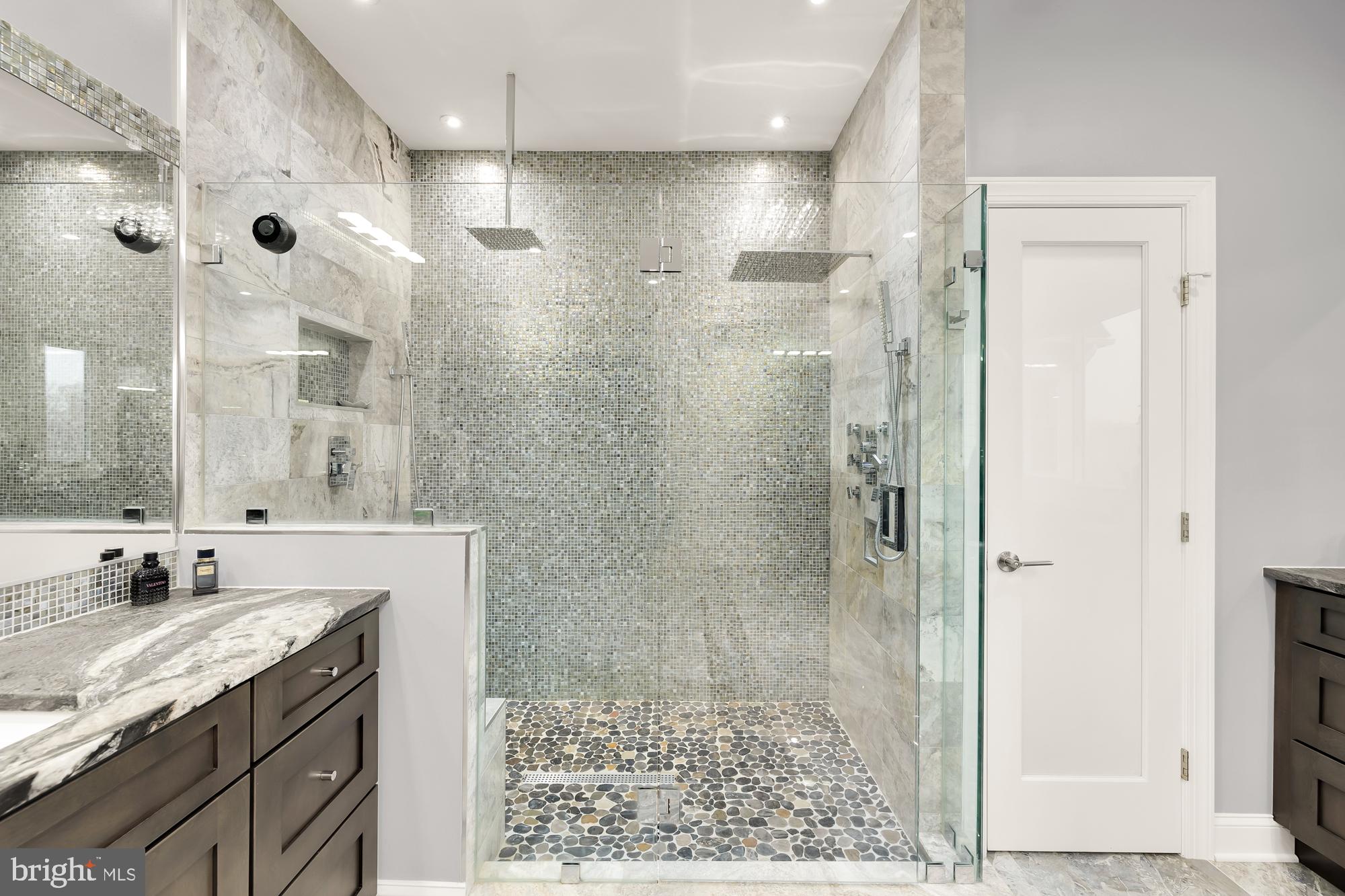 19109 Peale Lane Leesburg, VA 20175 - Photo 51 of 135 a bathroom with a granite countertop shower sink and mirror