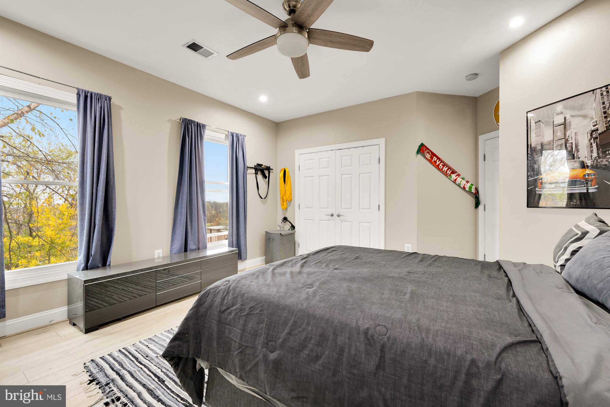 19109 Peale Lane Leesburg, VA 20175 - Photo 59 of 135 a bedroom with a bed and a large window