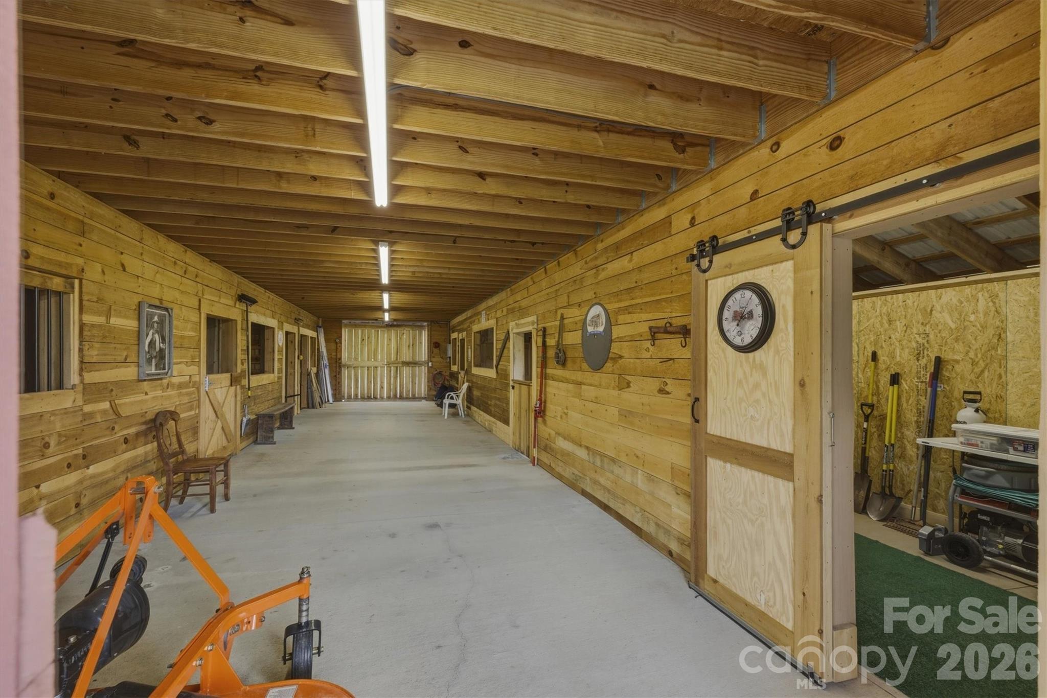 7490 Oak Ridge Church Road Connelly Springs, NC 28612 - Photo 40 of 44 a view of a garage with wooden roof