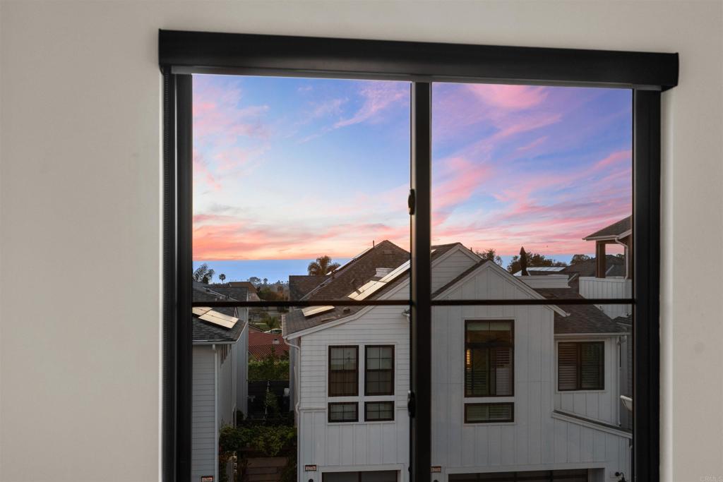 1602 San Remo Place, Unit 201 Encinitas, CA 92024 - Photo 27 of 56 a view of a sky from a window