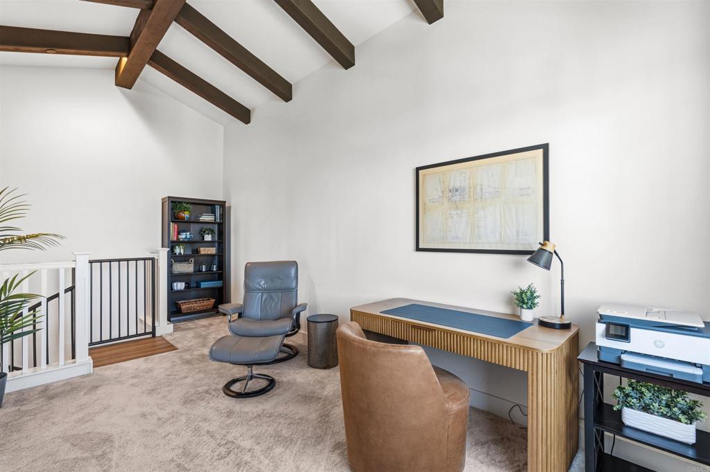 1602 San Remo Place, Unit 201 Encinitas, CA 92024 - Photo 28 of 56 a living room with furniture and a window