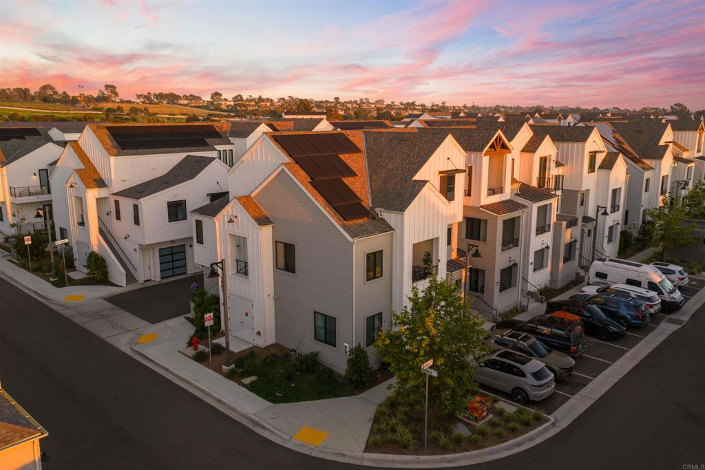 1602 San Remo Place, Unit 201 Encinitas, CA 92024 - Photo 32 of 56 a view of a house with a ocean view