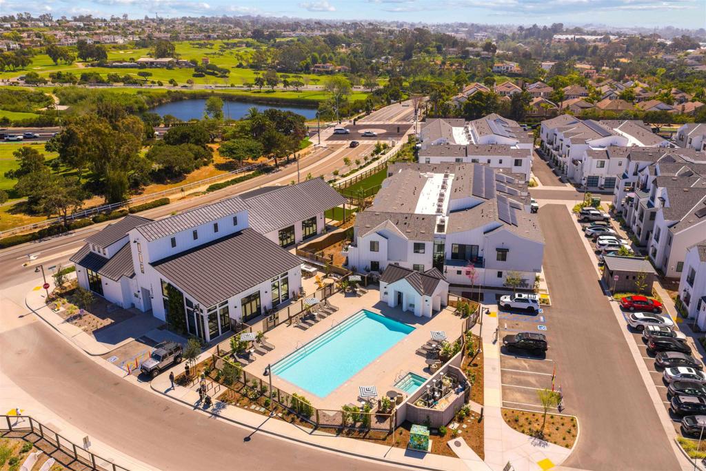 1602 San Remo Place, Unit 201 Encinitas, CA 92024 - Photo 40 of 56 an aerial view of residential houses with outdoor space