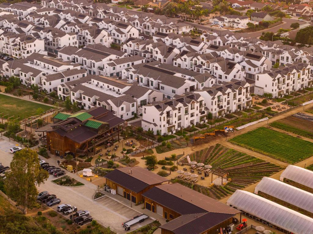 1602 San Remo Place, Unit 201 Encinitas, CA 92024 - Photo 46 of 56 an aerial view of residential houses with outdoor space