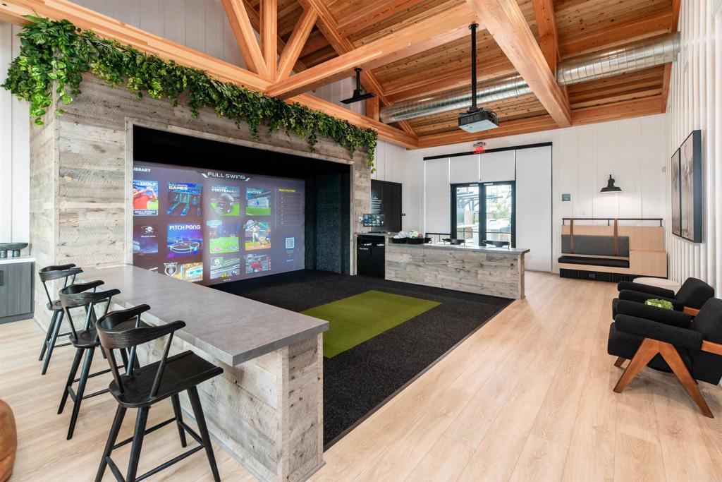 1602 San Remo Place, Unit 201 Encinitas, CA 92024 - Photo 9 of 56 a view of a dining room with furniture and a flat screen tv