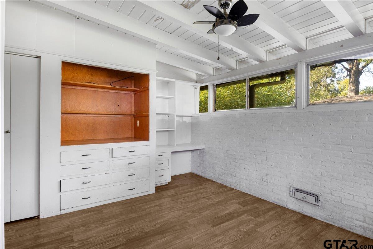 904 East Dulse Street Tyler, TX 75701 - Photo 18 of 27 a view of room with window and wooden floor