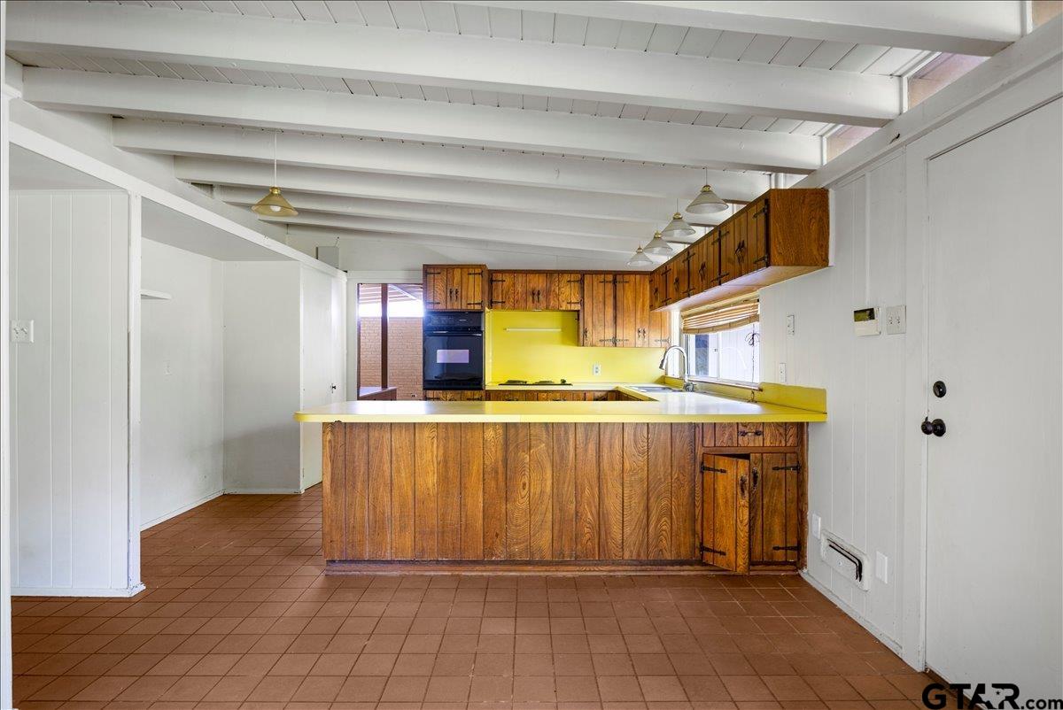 904 East Dulse Street Tyler, TX 75701 - Photo 9 of 27 a bathroom with a sink and a mirror