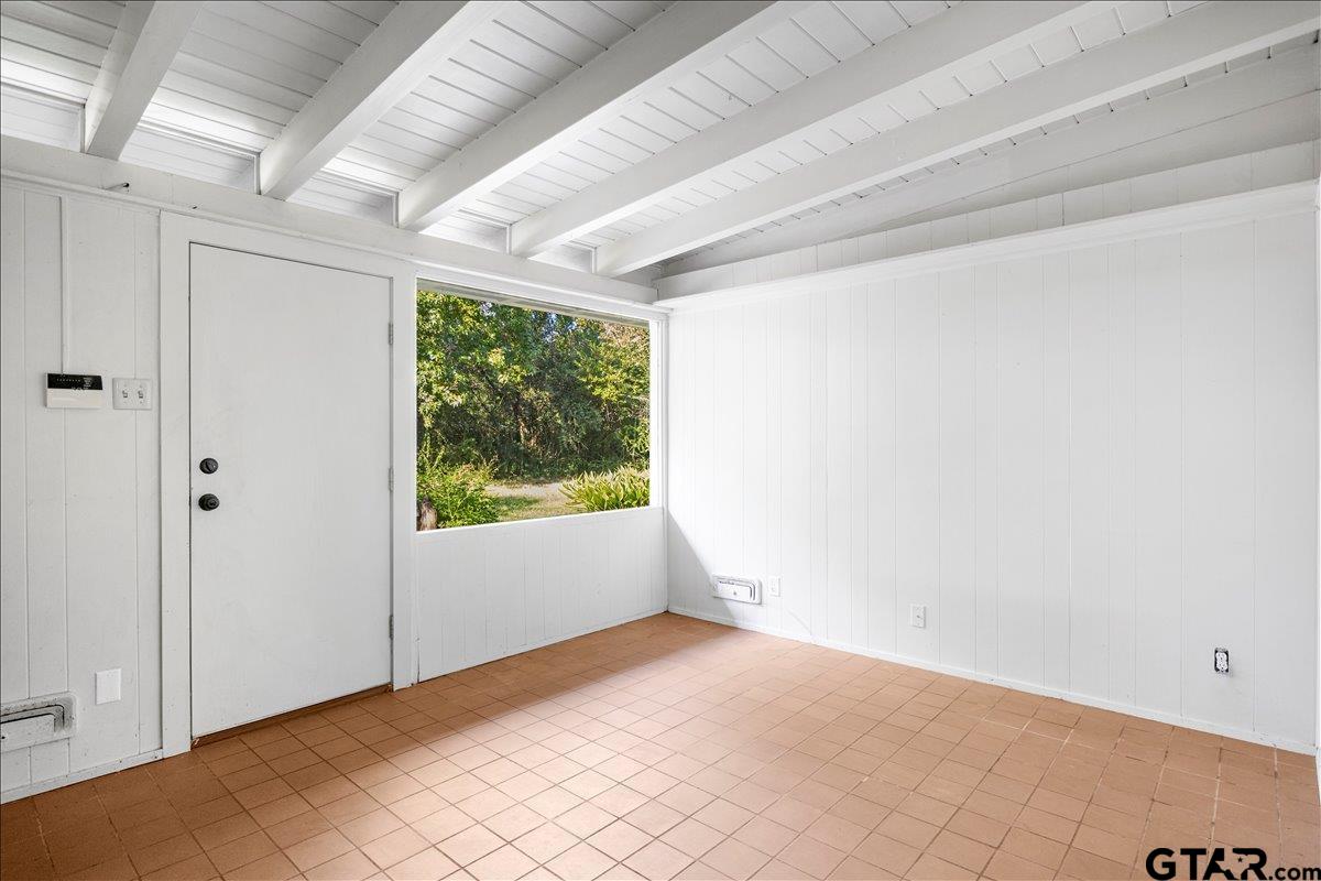 904 East Dulse Street Tyler, TX 75701 - Photo 10 of 27 a view of an empty room with a window
