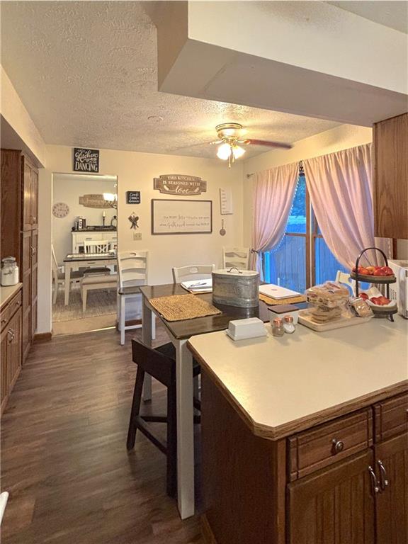 1993 Mercer West Middlesex Road Mercer, PA 16137 - Photo 19 of 27 a kitchen with a sink a stove and chairs