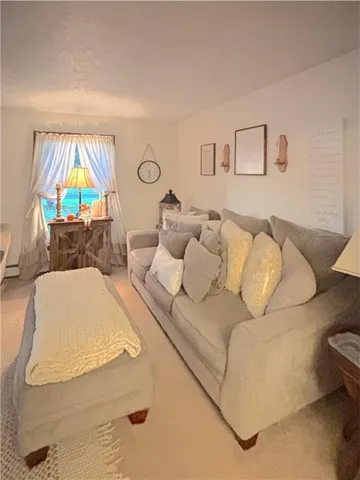 a living room with a couch and a table