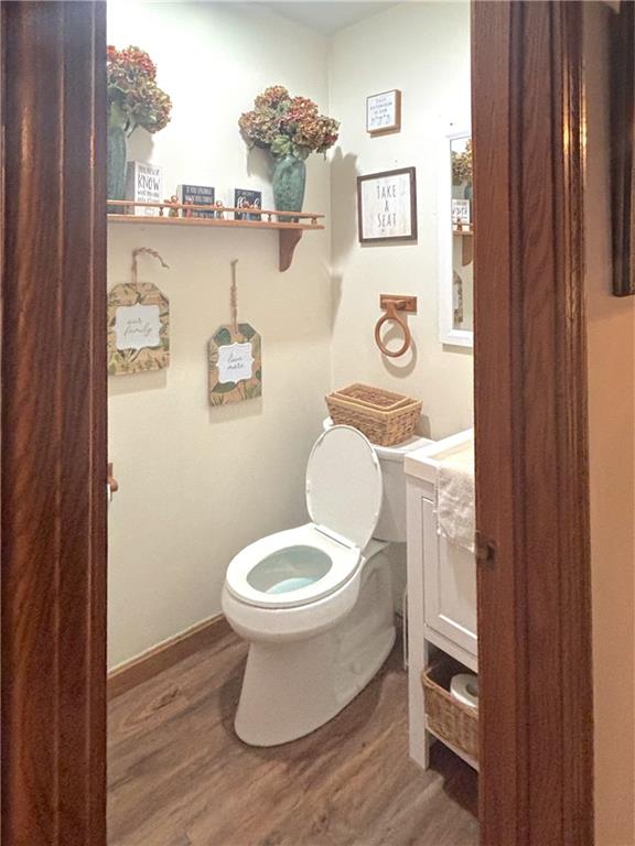 1993 Mercer West Middlesex Road Mercer, PA 16137 - Photo 27 of 27 a white toilet sitting next to a bathroom sink