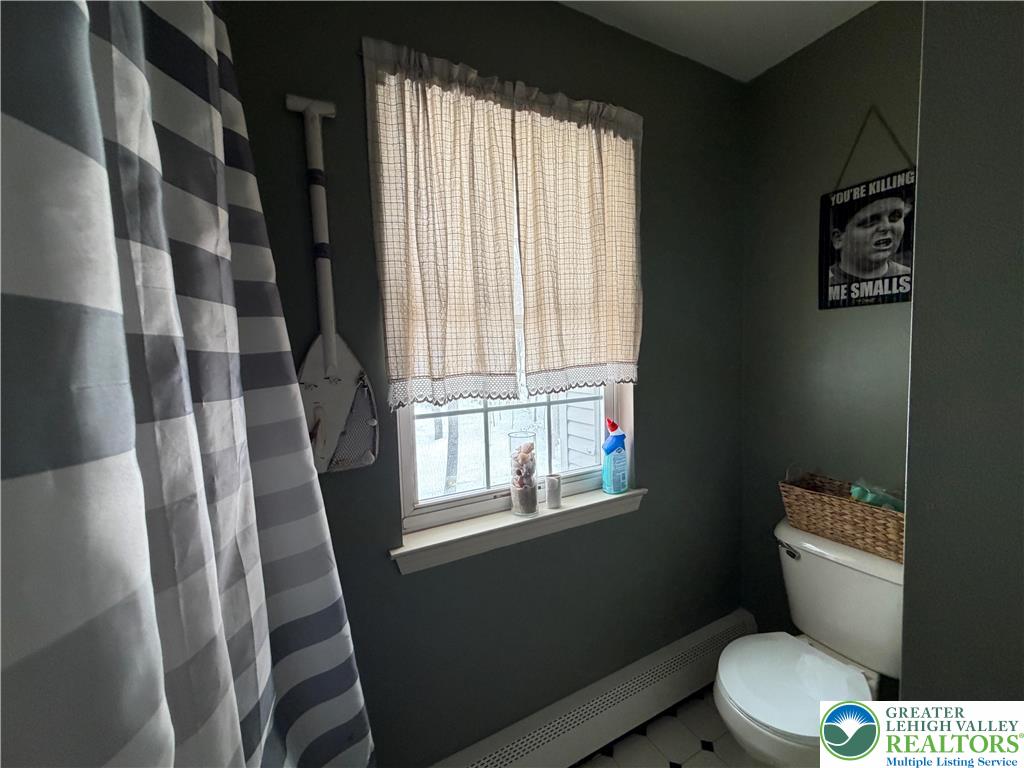 303 East Mountain Top Road Summit Hill, PA 18250 - Photo 25 of 31 a white toilet sitting next to a window