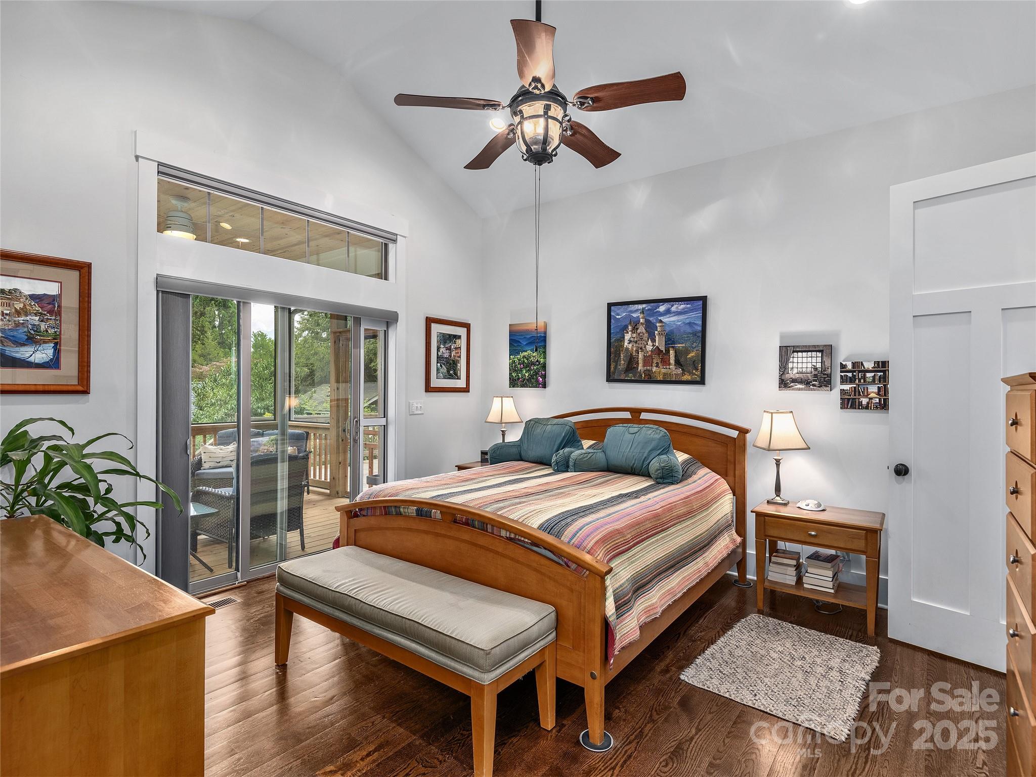 108 Enthoffer Road Black Mountain, NC 28711 - Photo 12 of 31 a bed room with a bed and a chandelier