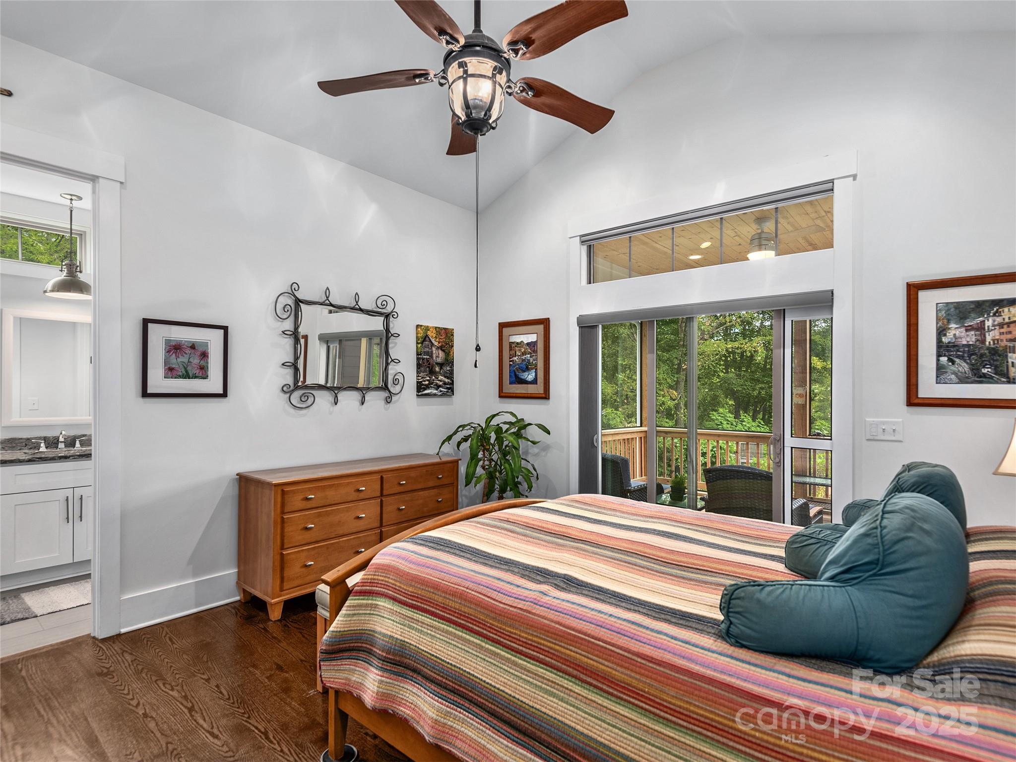 108 Enthoffer Road Black Mountain, NC 28711 - Photo 13 of 31 a bedroom with a bed a couch and a window