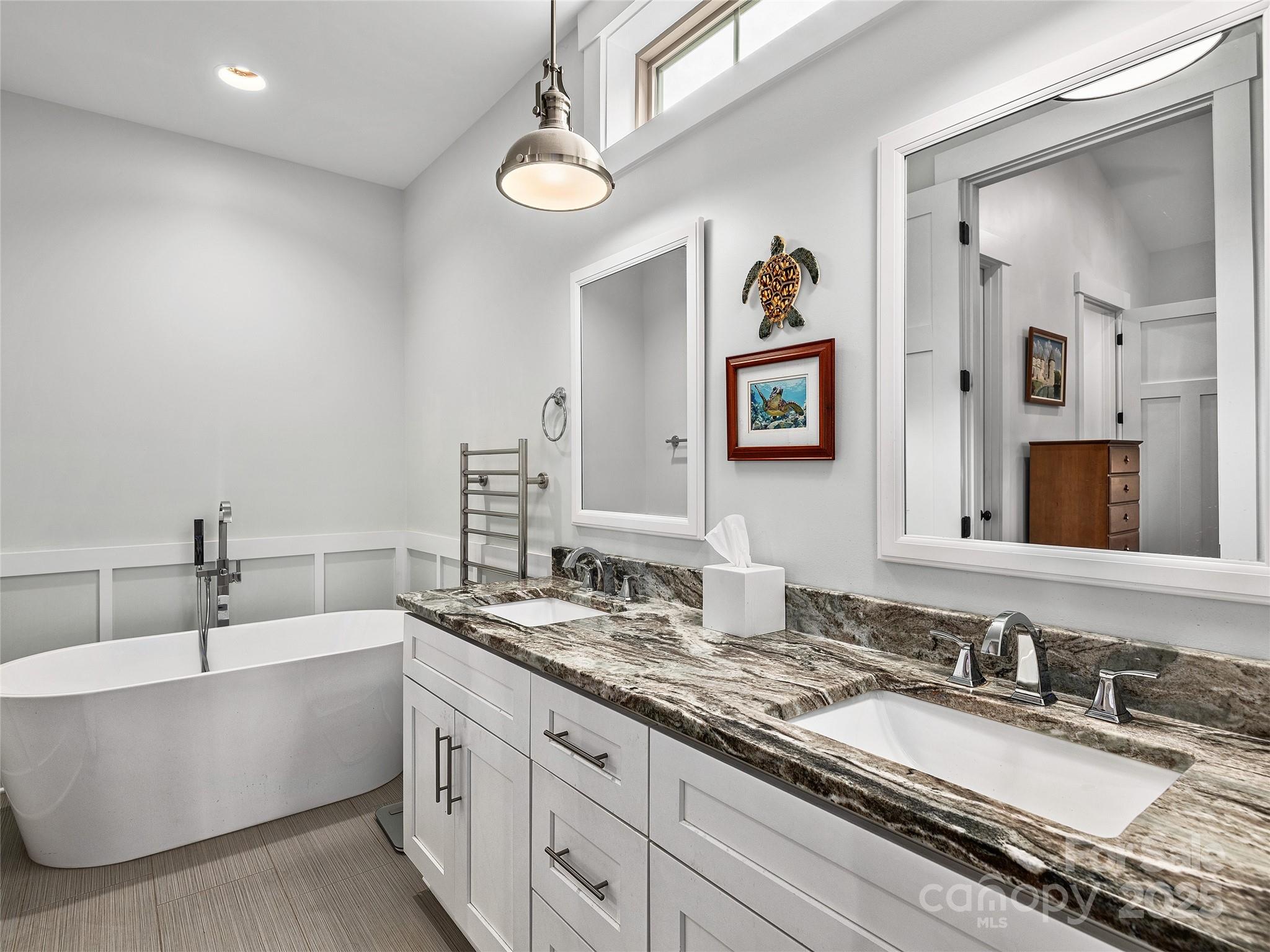 108 Enthoffer Road Black Mountain, NC 28711 - Photo 14 of 31 a bathroom with a granite countertop double vanity sink and a mirror