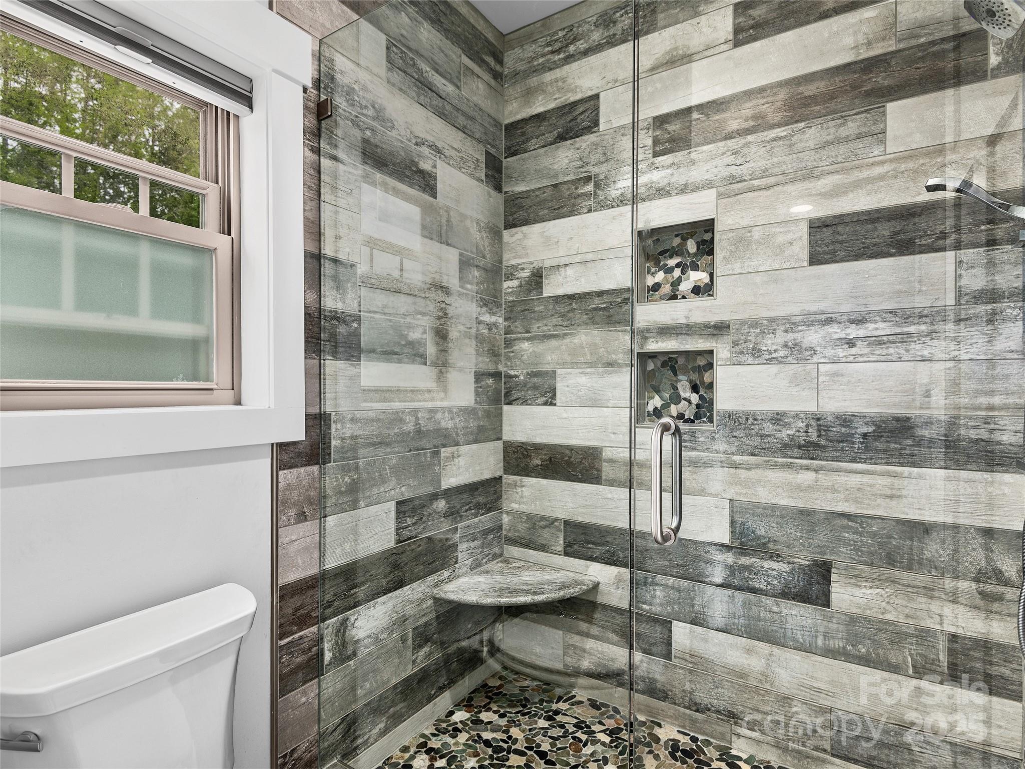 108 Enthoffer Road Black Mountain, NC 28711 - Photo 15 of 31 a bathroom with a toilet and a shower