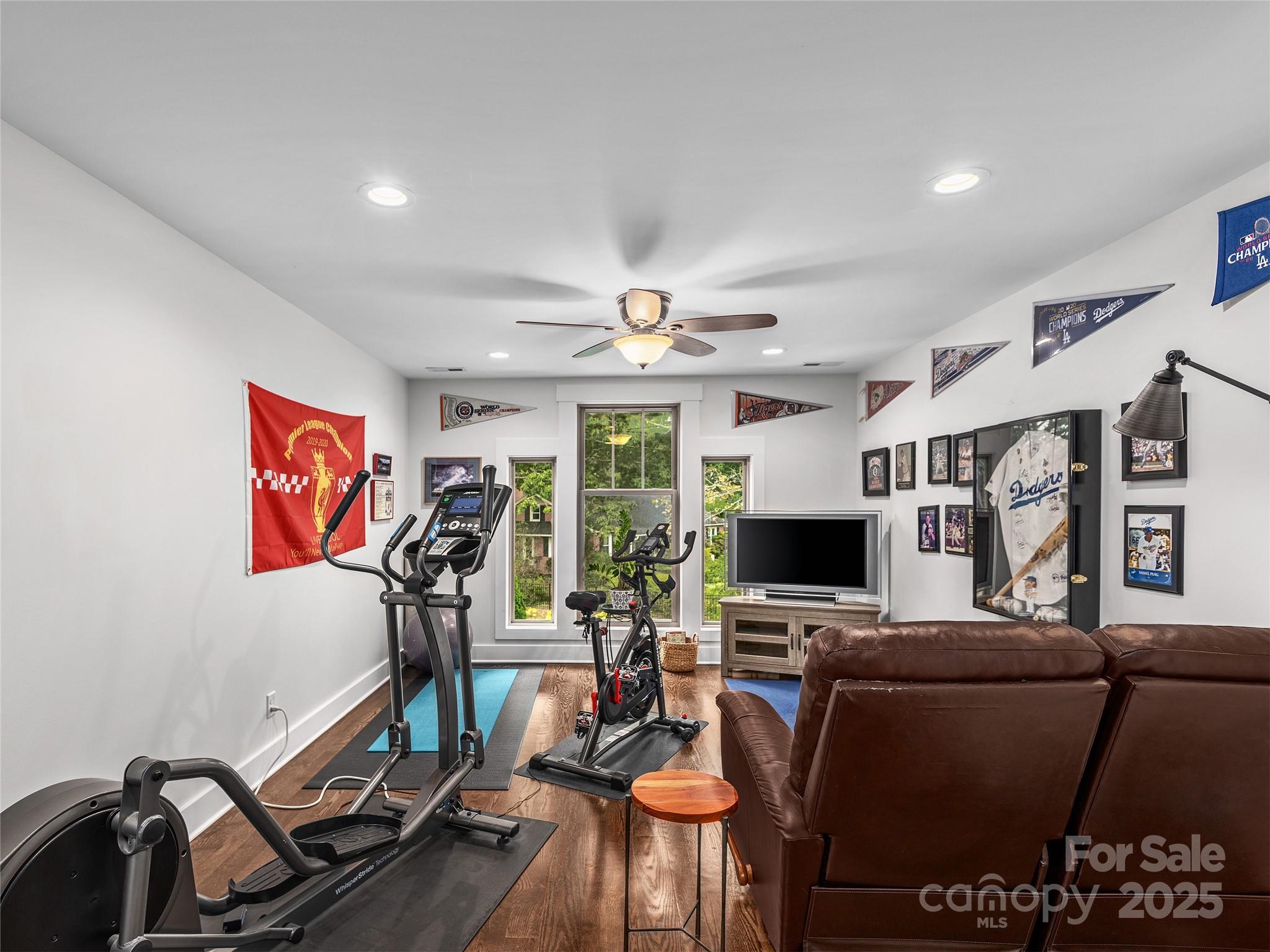 108 Enthoffer Road Black Mountain, NC 28711 - Photo 17 of 31 a view of a workspace with furniture and a flat screen tv