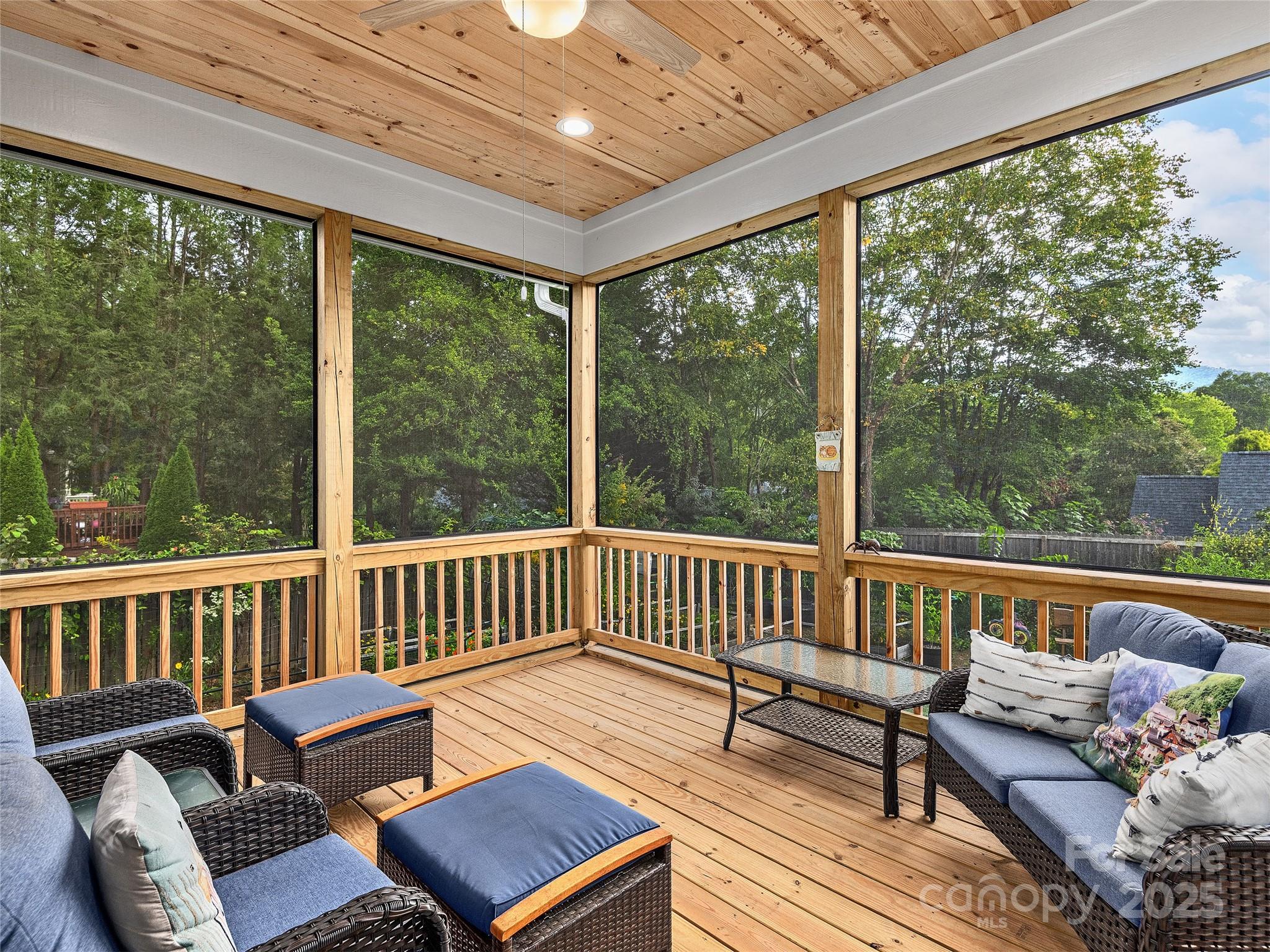 108 Enthoffer Road Black Mountain, NC 28711 - Photo 24 of 31 a balcony with wooden floor and outdoor seating