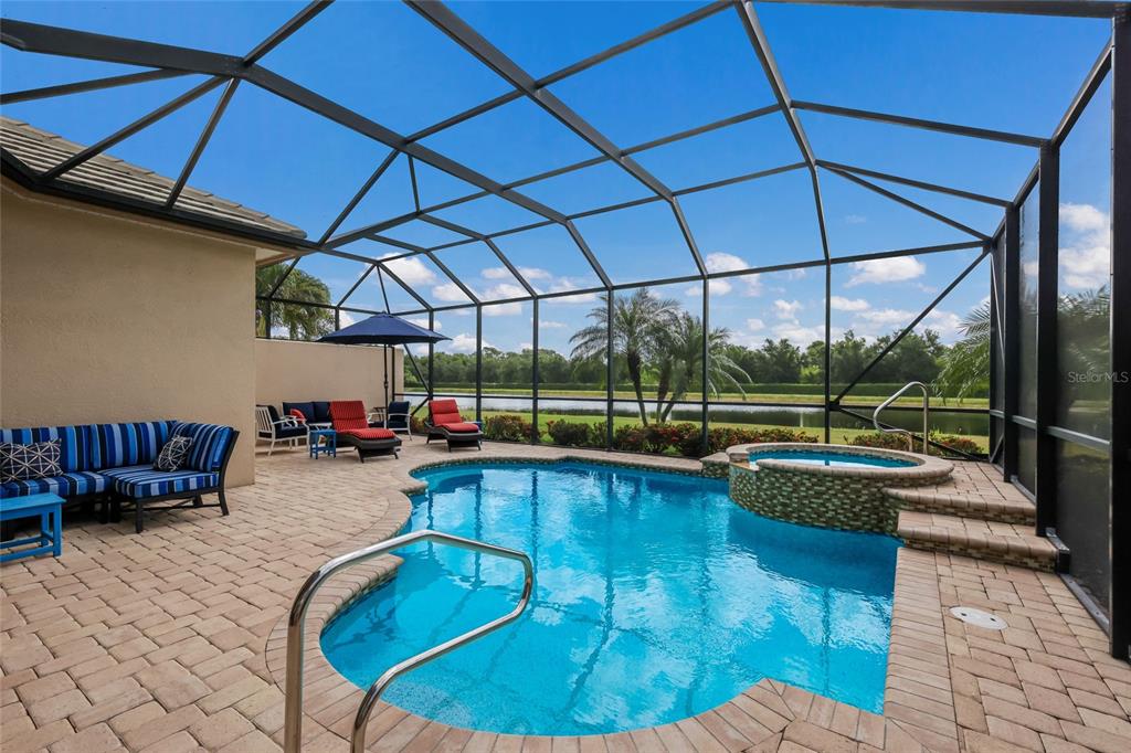 5011 Tobermory Way Bradenton, FL 34211 - Photo 26 of 77 a view of a swimming pool with a patio
