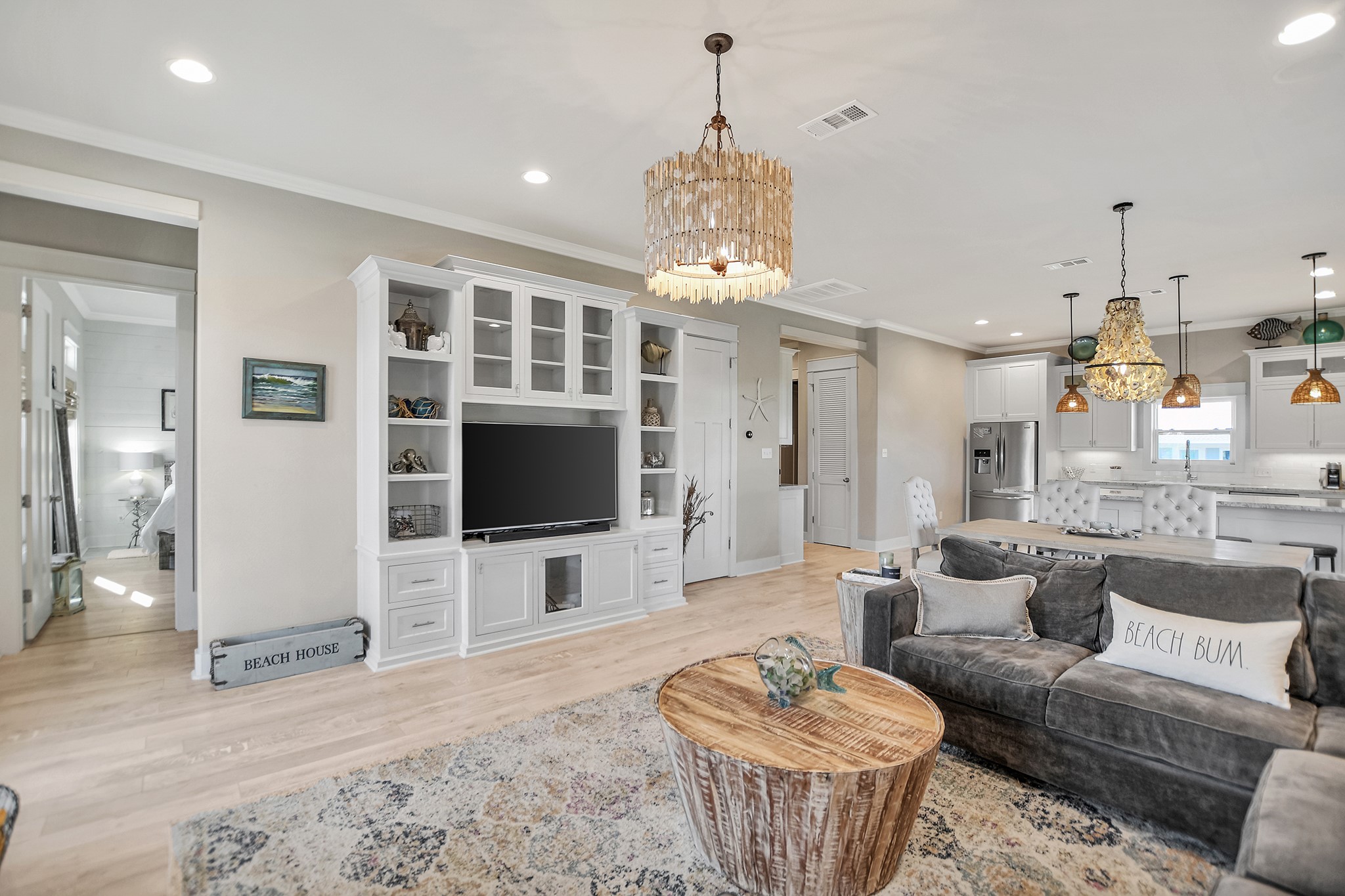 2570 Tide Road Port Bolivar, TX 77650 - Photo 18 of 50 a living room with furniture a dining table and a flat screen tv