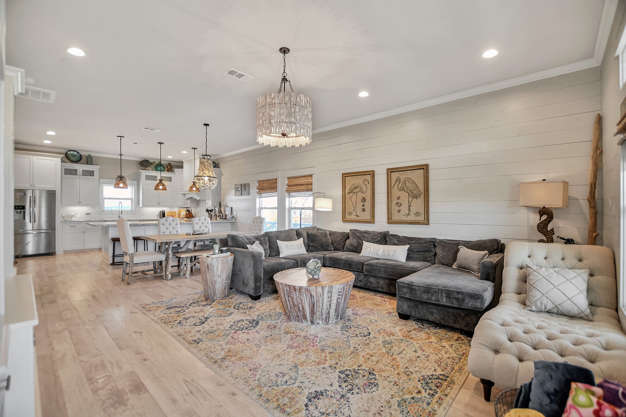 2570 Tide Road Port Bolivar, TX 77650 - Photo 2 of 50 a living room with lots of furniture and kitchen view