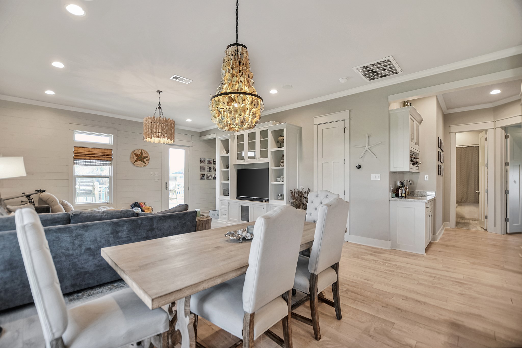 2570 Tide Road Port Bolivar, TX 77650 - Photo 21 of 50 a view of a dining room with furniture window and wooden floor