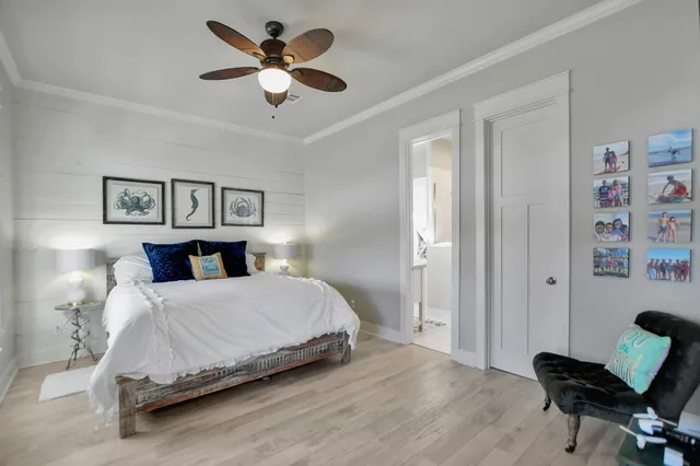 a bedroom with a bed and a desk