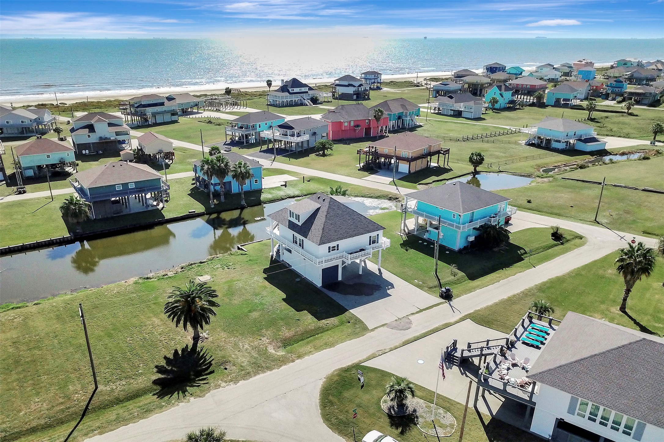 2570 Tide Road Port Bolivar, TX 77650 - Photo 3 of 50 an aerial view of a house with a garden