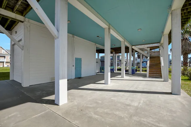 a view of a house with entrance gate