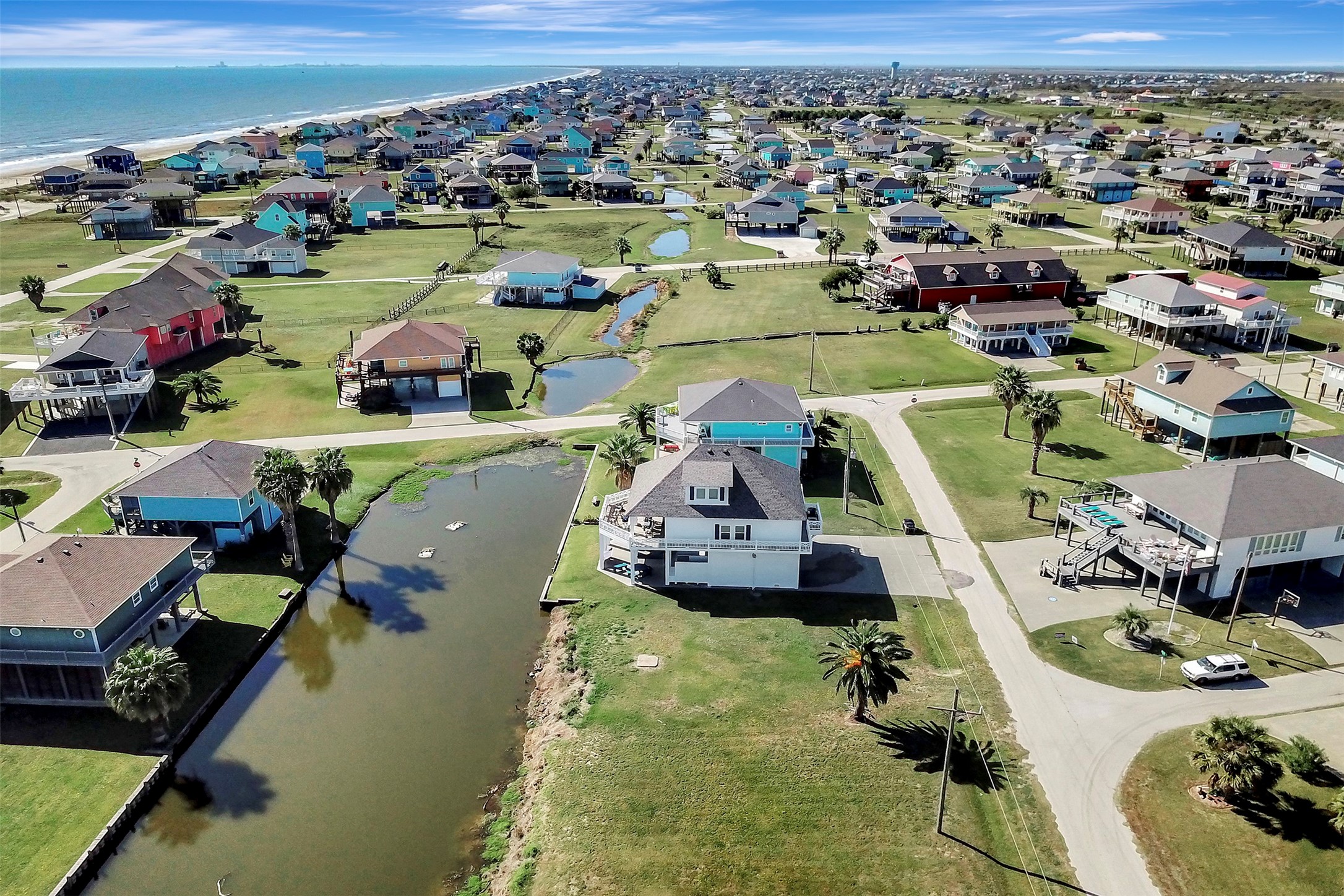 2570 Tide Road Port Bolivar, TX 77650 - Photo 46 of 50 an aerial view of a house with a swimming pool