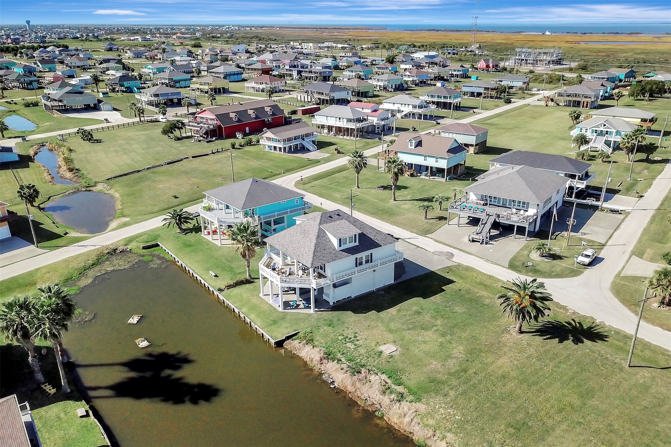 2570 Tide Road Port Bolivar, TX 77650 - Photo 47 of 50 an aerial view of a house with a swimming pool