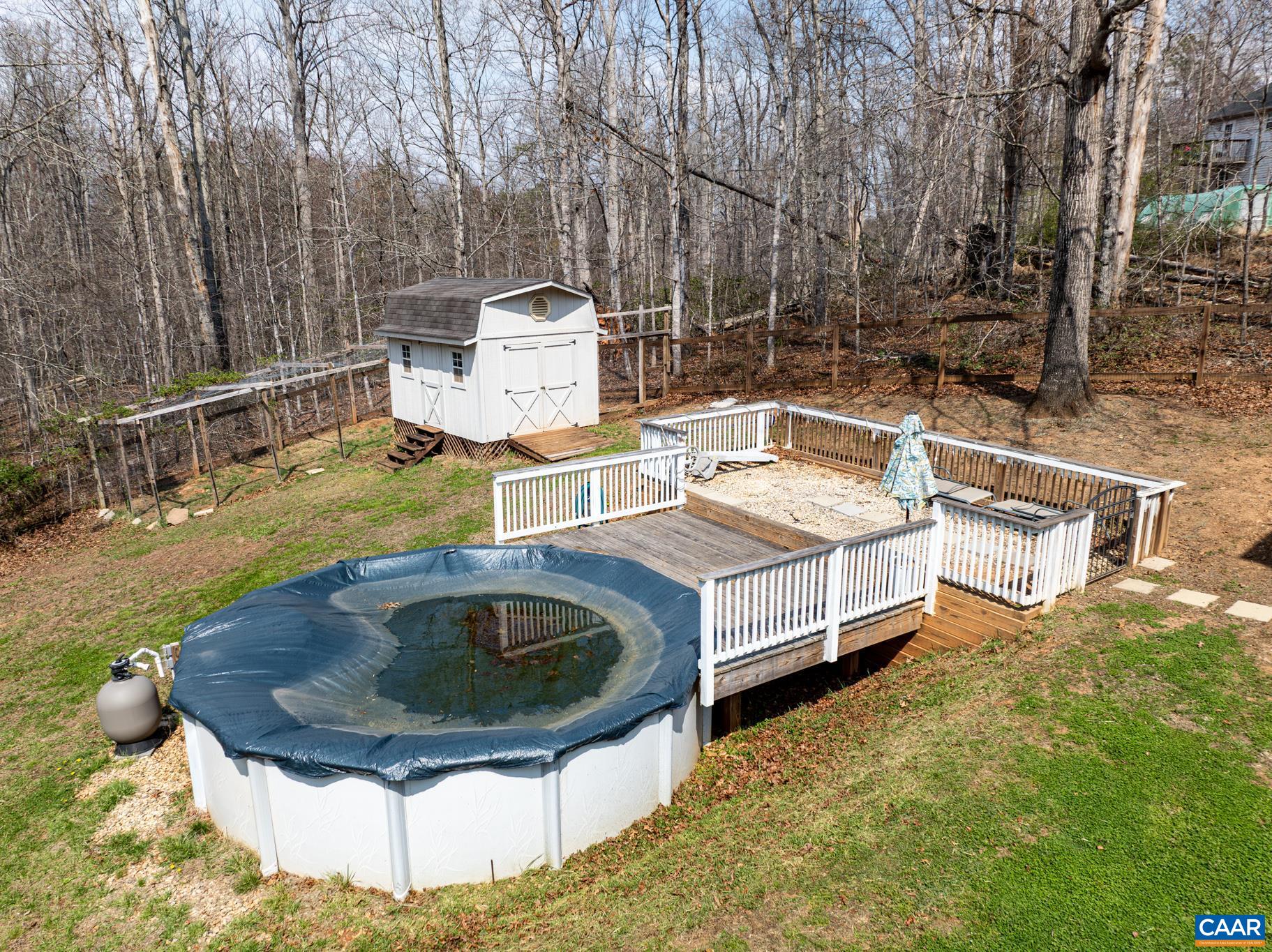 1029 West Daffodil Road Ruckersville, VA 22968 - Photo 37 of 39 a view of a swimming pool with a yard