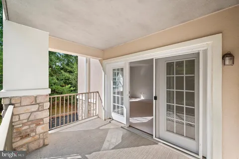 a view of a balcony with window