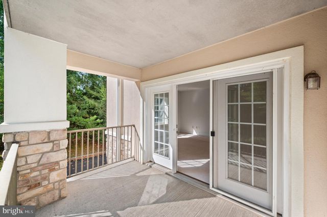 a view of a balcony with window