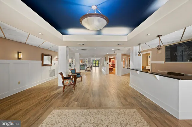 a view of a living room and dining room