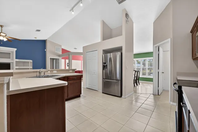 an aerial view of residential building with parking space