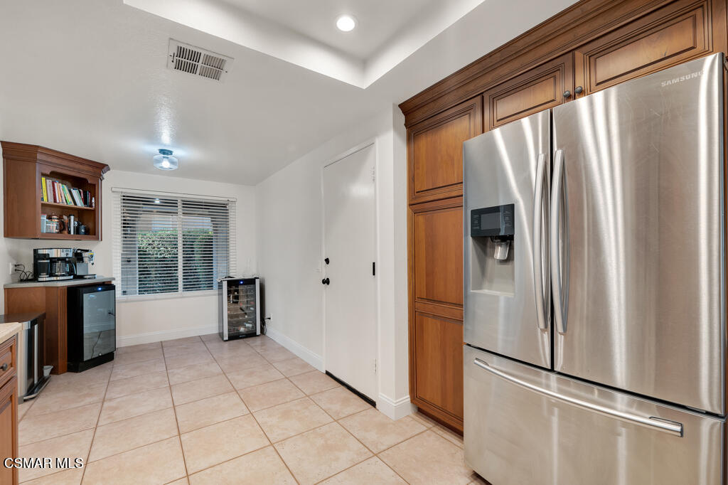16 Valley Crest Road Simi Valley, CA 93065 - Photo 15 of 41 a kitchen with stainless steel appliances granite countertop a refrigerator and a stove top oven