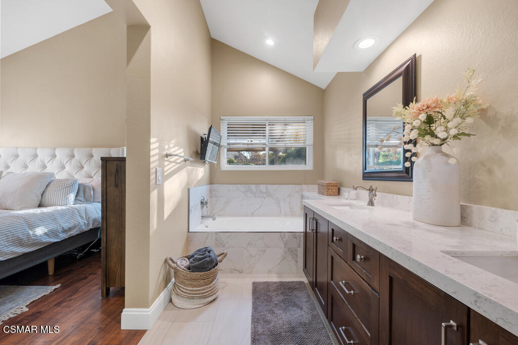 16 Valley Crest Road Simi Valley, CA 93065 - Photo 21 of 41 a spacious bathroom with a granite countertop sink a toilet and a large mirror