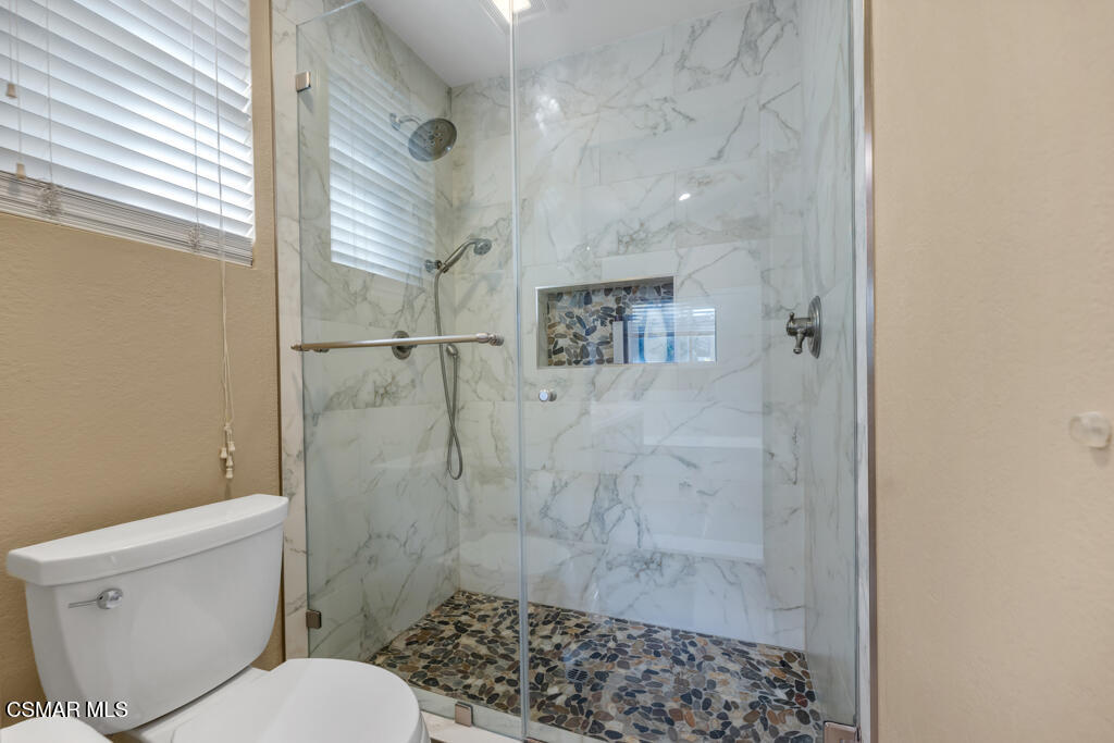 16 Valley Crest Road Simi Valley, CA 93065 - Photo 22 of 41 a bathroom with a toilet and a shower