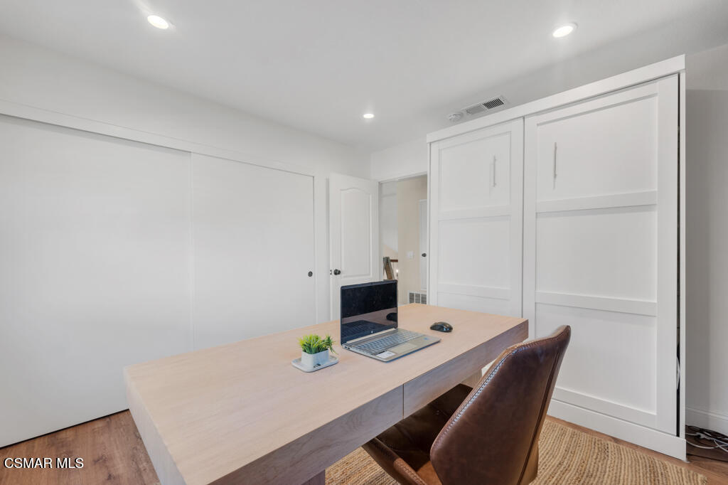 16 Valley Crest Road Simi Valley, CA 93065 - Photo 26 of 41 a workspace with furniture and wooden floor