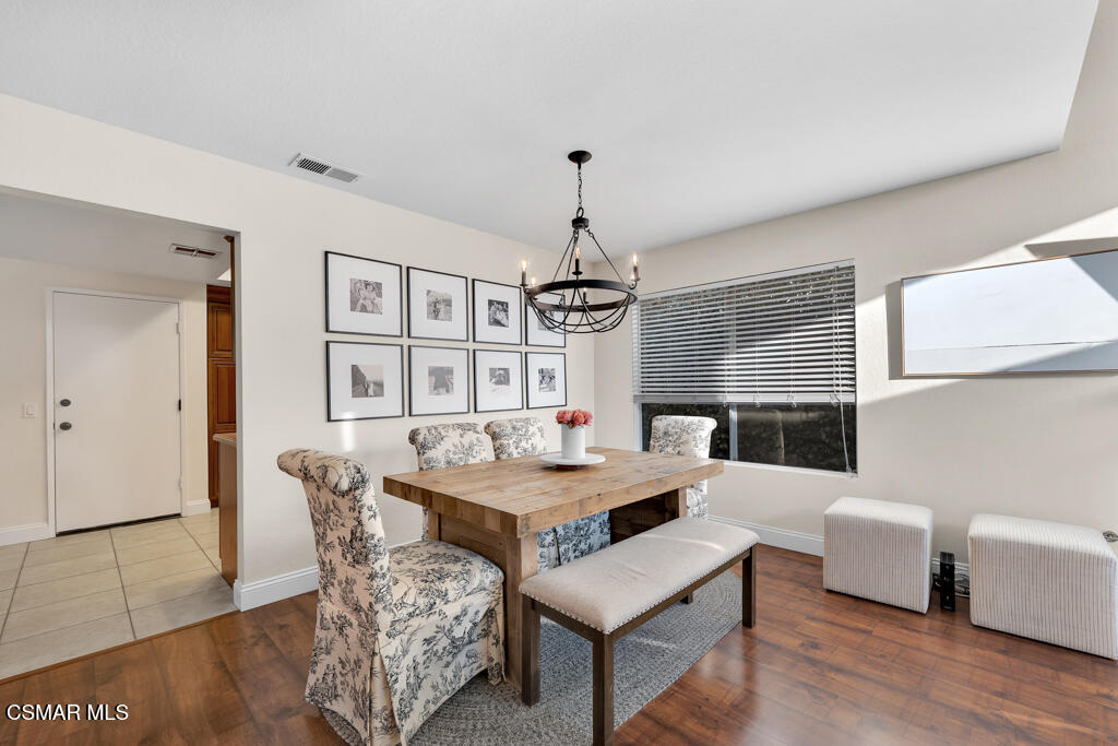 16 Valley Crest Road Simi Valley, CA 93065 - Photo 7 of 41 a view of a dining room with furniture and wooden floor