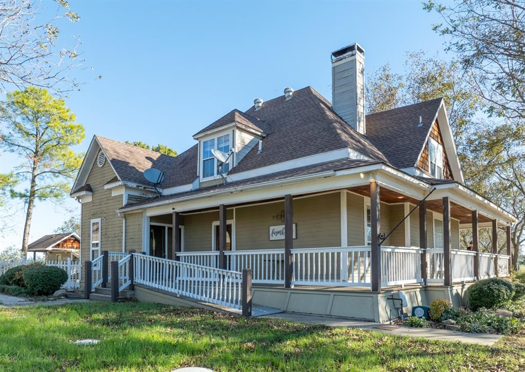 7450 Fm 982 Princeton, TX 75407 - Photo 6 of 13 a view of a house with a yard